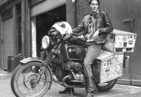 <h3>An adventure pioneer</h3>

How did Elspeth Beard became the first Englishwoman to ride a motorcycle around the world? While she is studying archaeology in England, Elspeth starts to feel like discovering other places. With her BMW R 60/6, which she works on alone in her garage, she travels through Ireland and Scotland, then mainly Europe. In the first two years of her bike ownership, she will rack up over 10,000 miles. This spirit of discovery will never leave her from then on, instead it starts to grow...and it grows big! It's decided: she will go travel the world after her third year of university. To get the necessary funds to carry out her project, she works in the bar of her university in the evening, after classes. After having saved enough money, she gears up and takes off to the Big Apple.