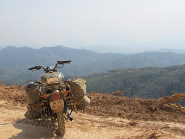 Riding along the rolling mountains of Laos