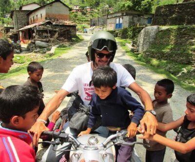 rider with children nepal